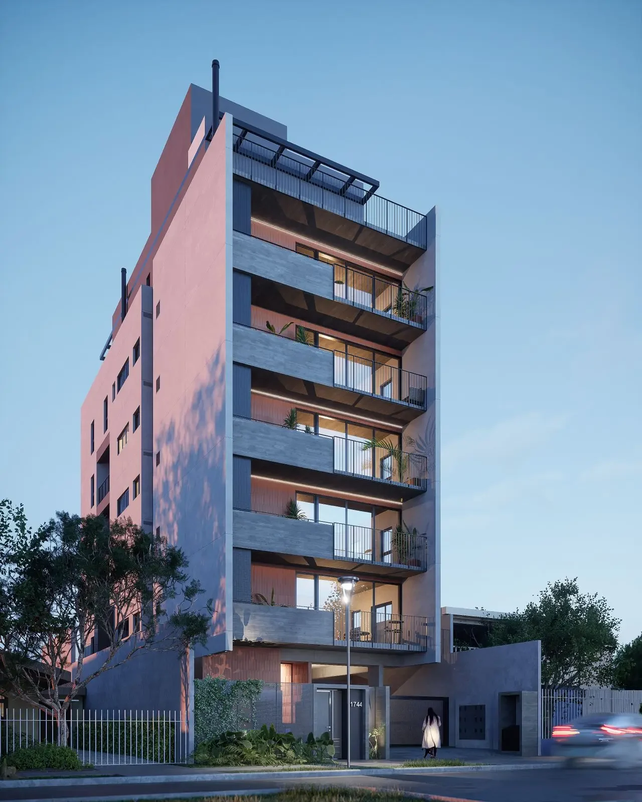 Fachada moderna do Edifício LIV São José dos Pinhais, com design contemporâneo e varandas iluminadas ao entardecer.